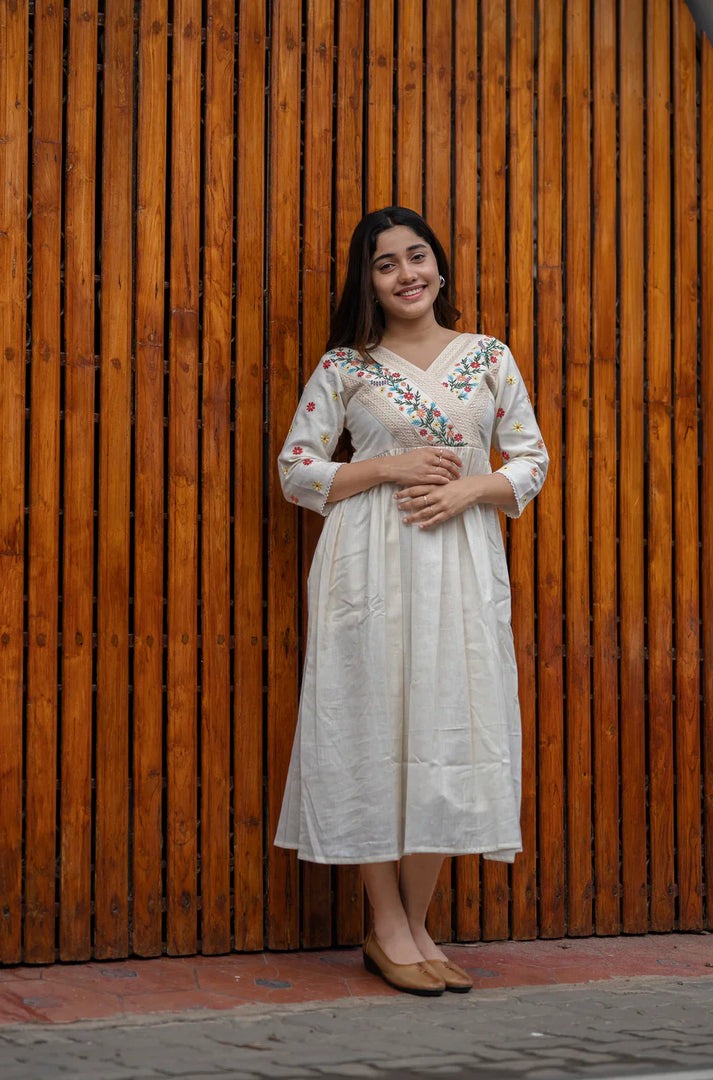Elegant Ivory Embroidered Cotton Kurti