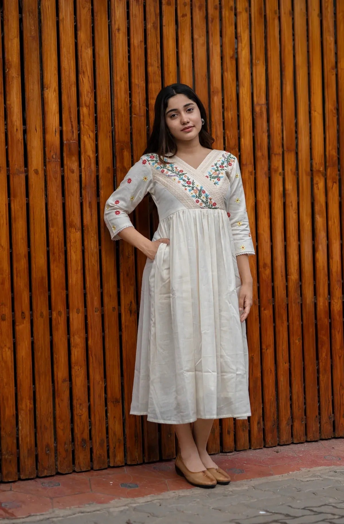 Elegant Ivory Embroidered Cotton Kurti