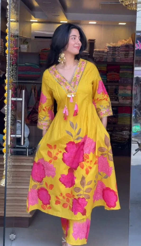 Women’s Yellow Cotton Floral Printed Anarkali Kurta with Tassel Detailing