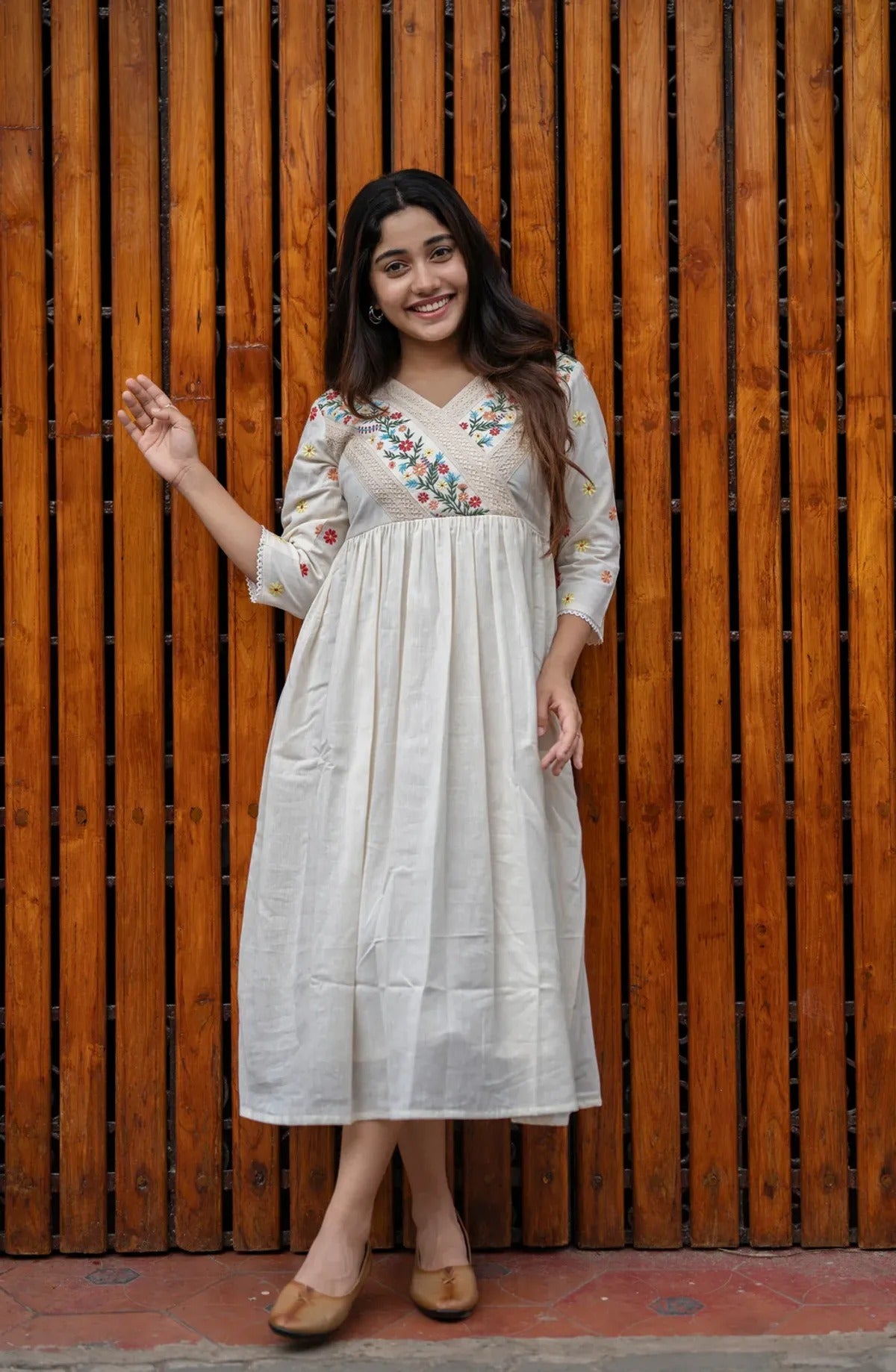 Elegant Ivory Embroidered Cotton Kurti