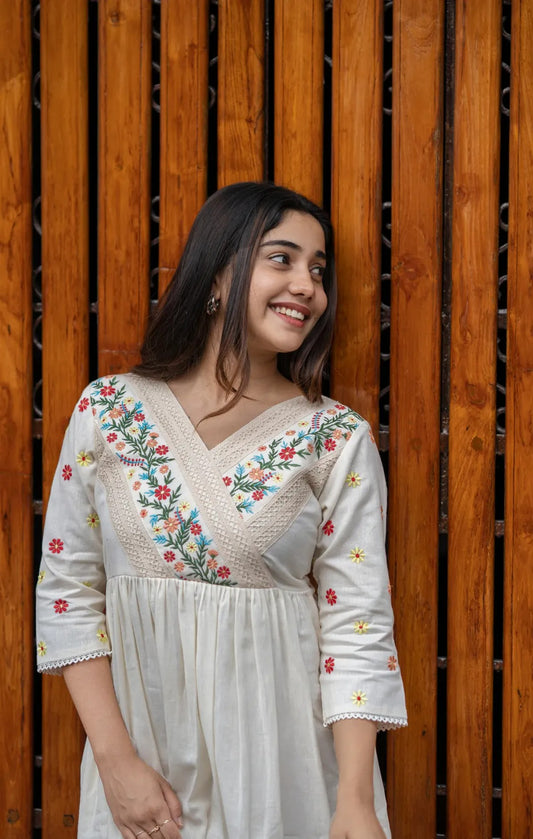 Elegant Ivory Embroidered Cotton Kurti